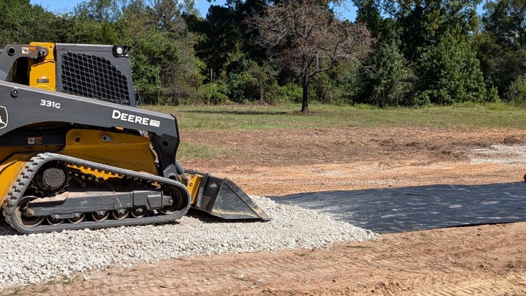 Skid Steer Spreading Gravel for Driveway or Building Pad